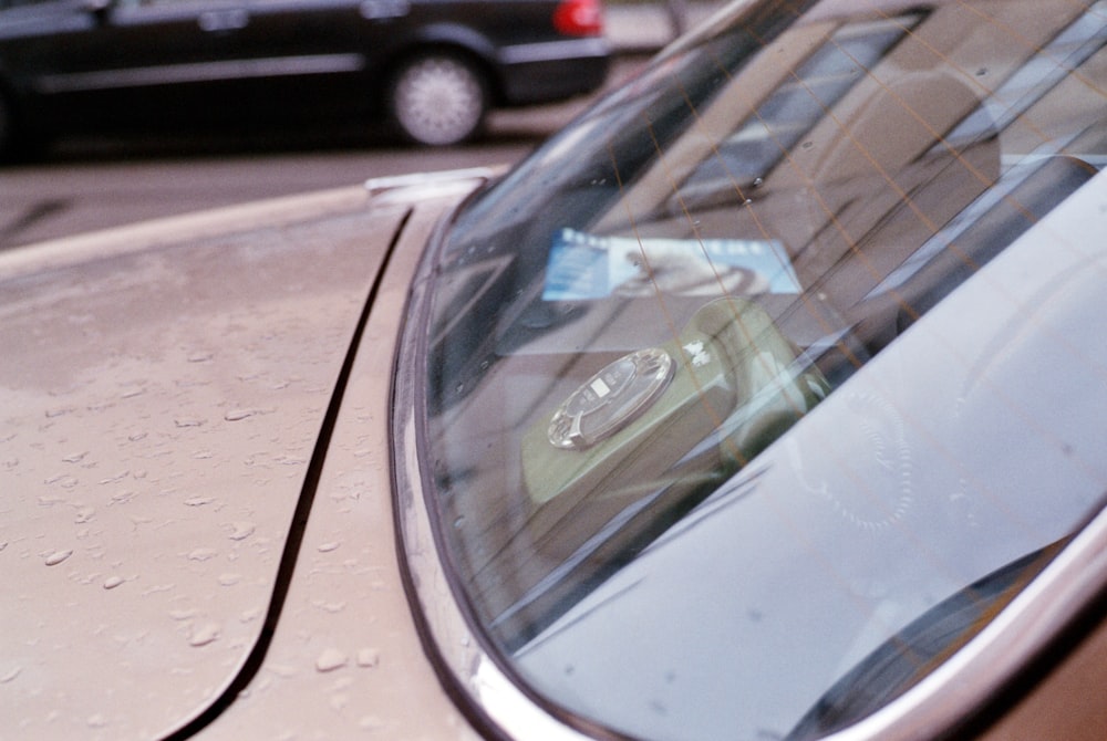 a close up of a car's side view mirror