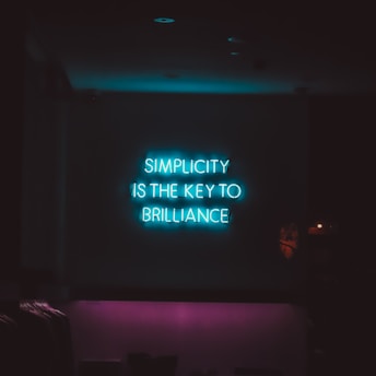 Simplicity is the Key to Brilliance LED words