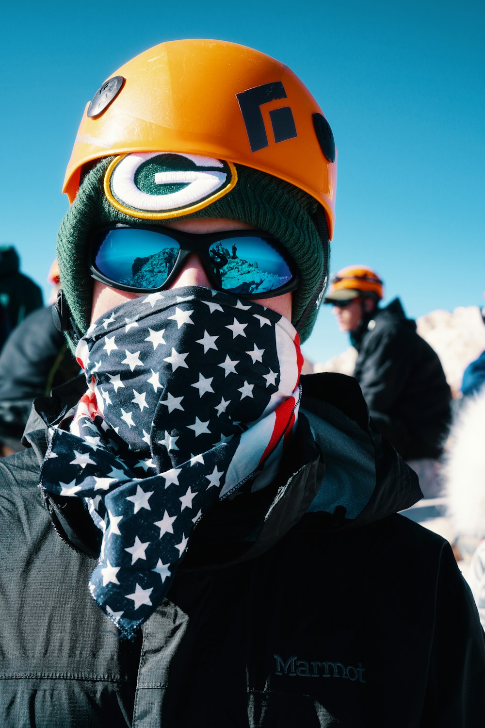 person wearing orange hat