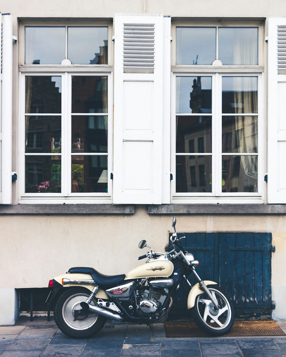 motorcycle parked outside house