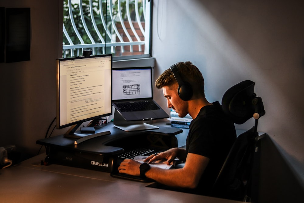 man in front of computer