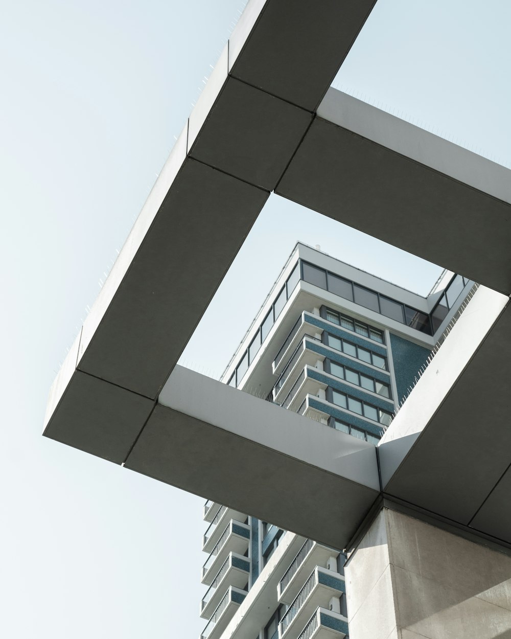 a tall building with a sky background