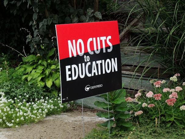 No cuts to Education signage