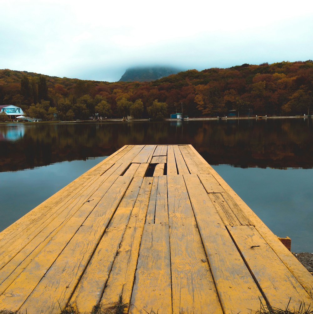 close-up photography of dock near body of water