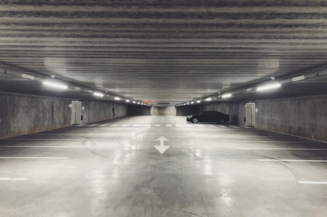 Closed garage space with room for one car, clean and secure.