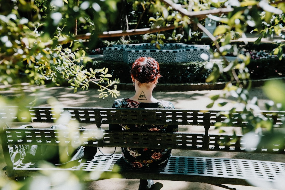 woman sitting on bench