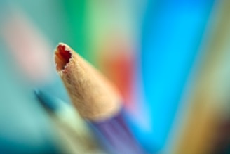 A vibrant close-up of a colored pencil drawing showcasing intricate shading and texture.