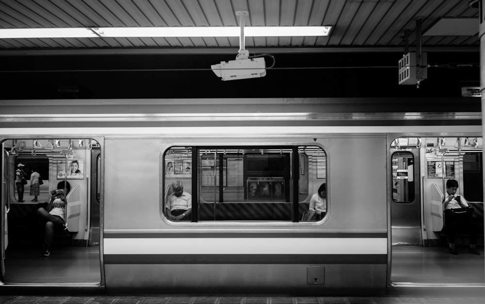 grayscale photography of train station