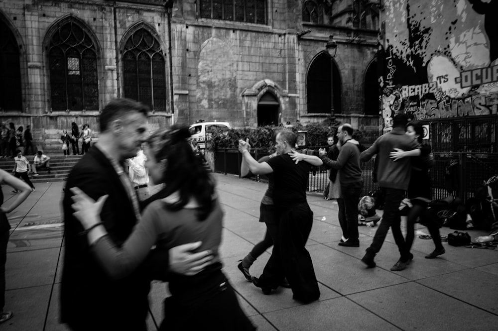 people dancing on street