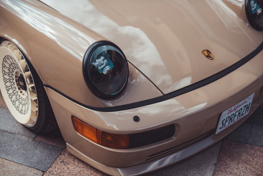 brown Porsche car