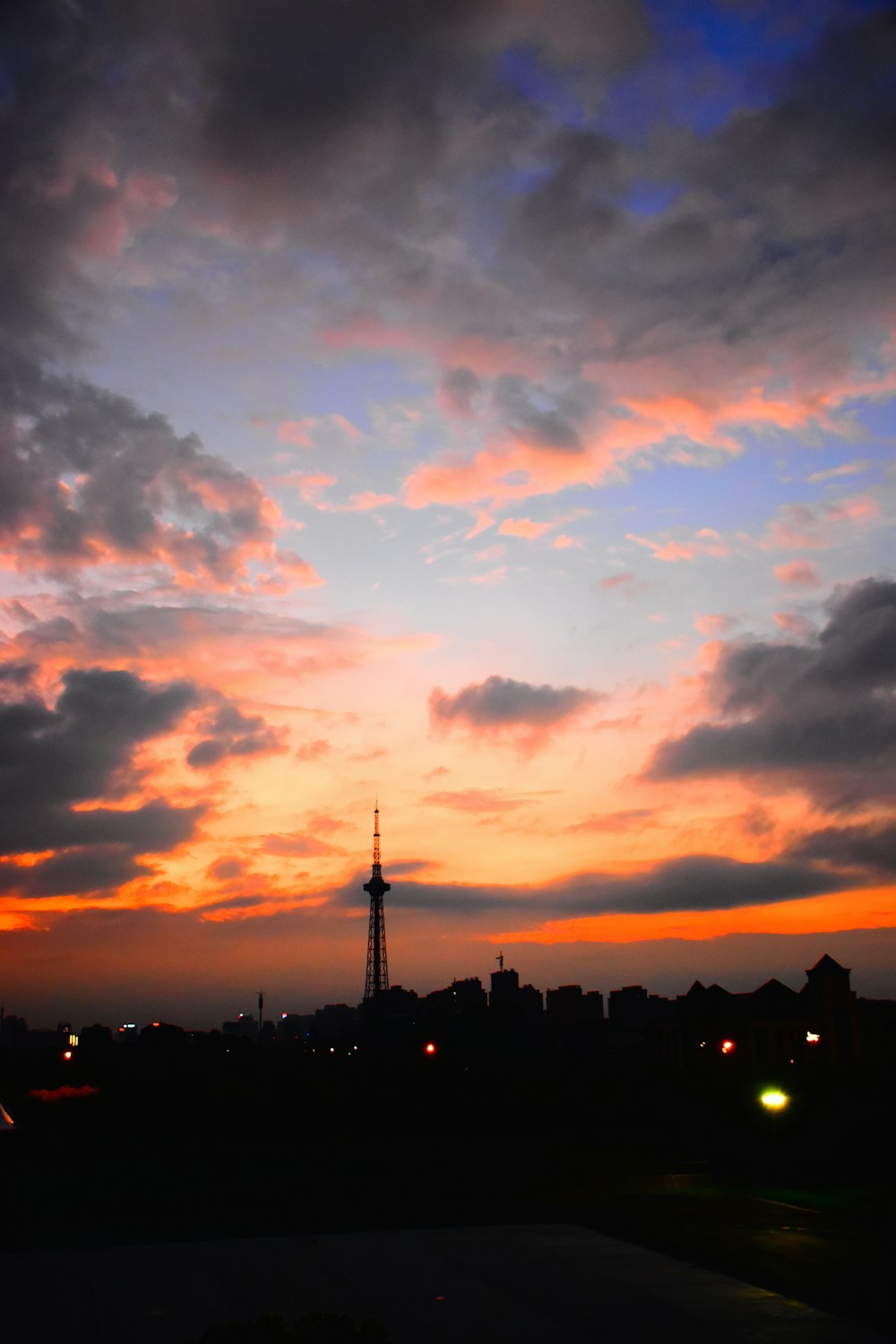 silhouette photo of transmission post