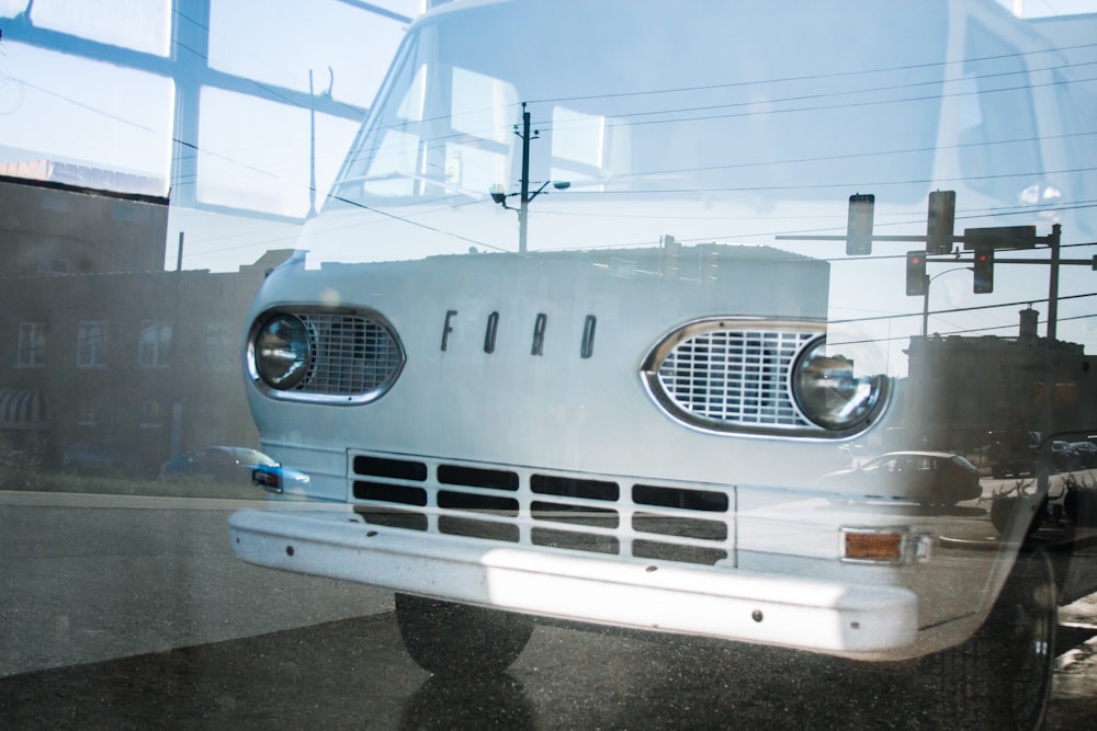 photo of white Ford van