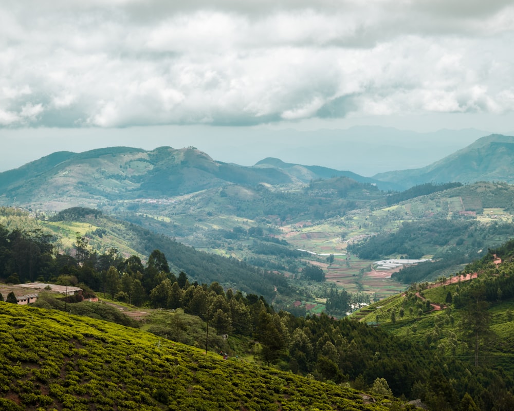 hills across mountain during daytime