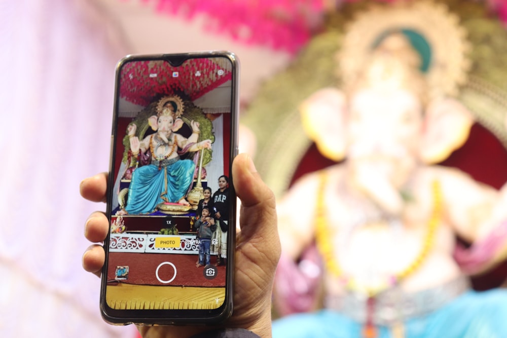 black Android smartphone displaying ganesha