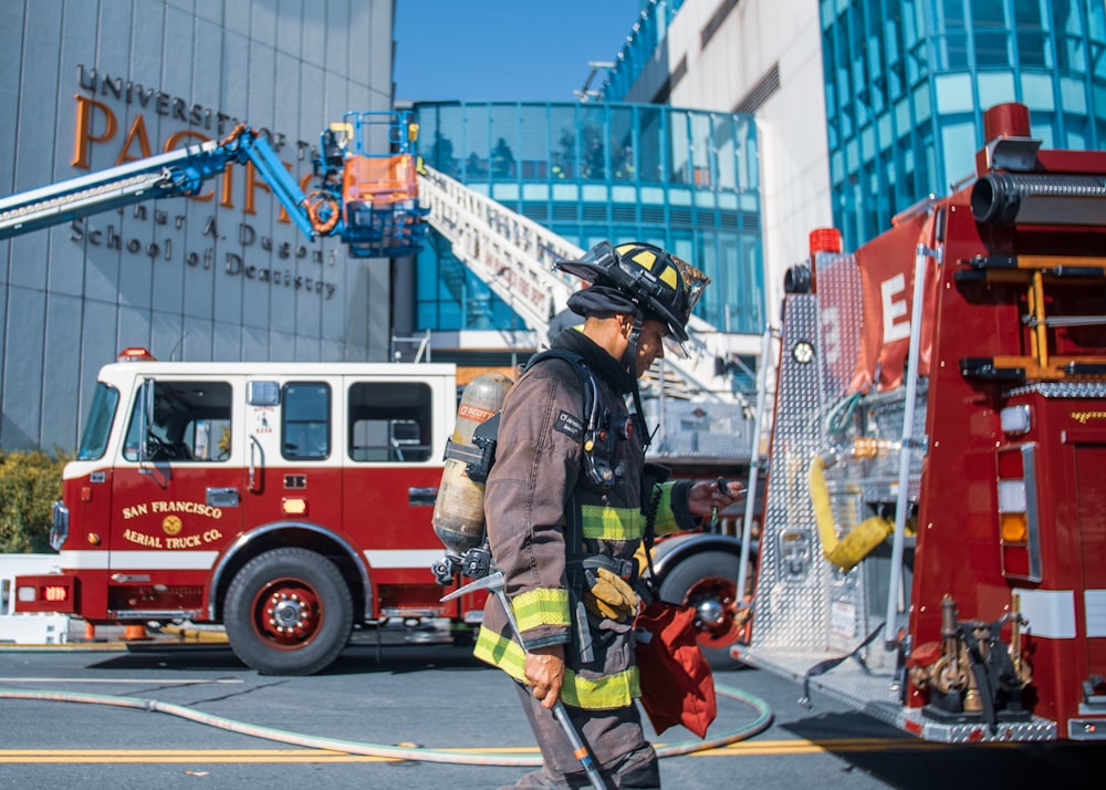 firefighters near building