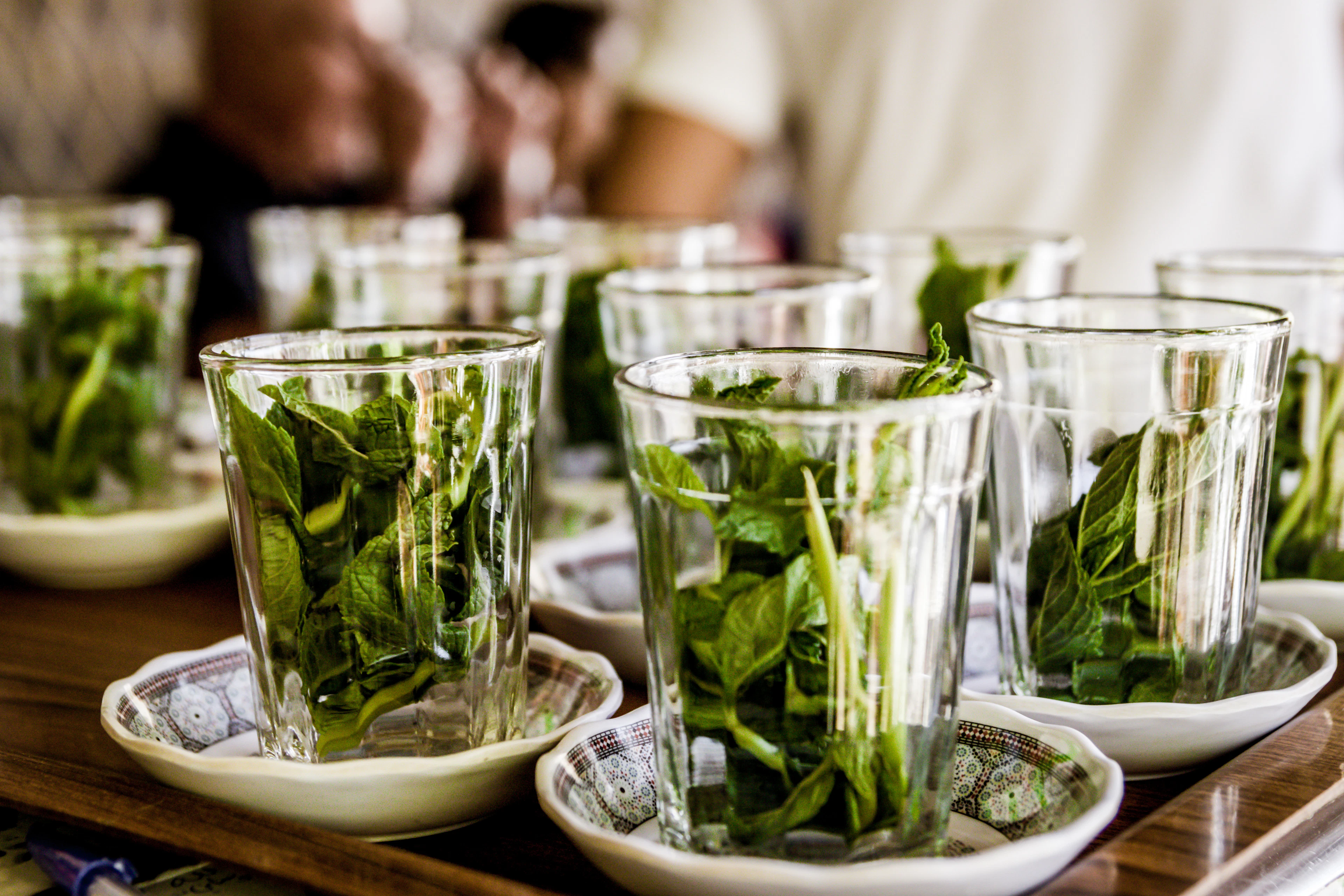 Glasses of Moroccan mint tea with fresh mint leaves