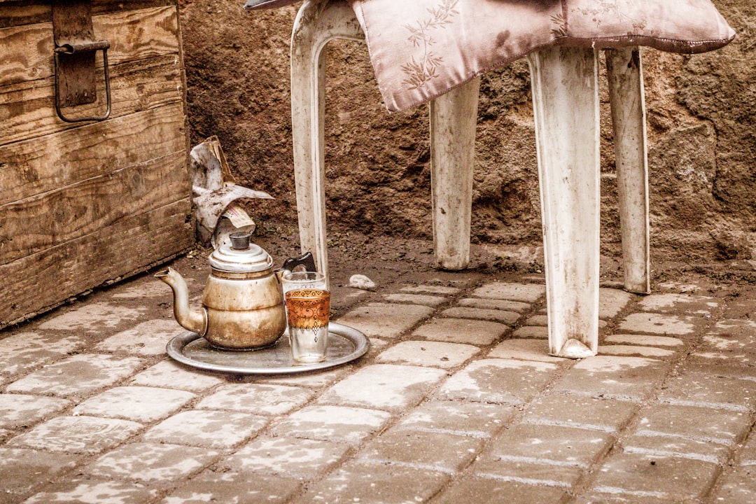 gray metal tea pot in tray, Mint tea in Marrakech is everywhere indeed!