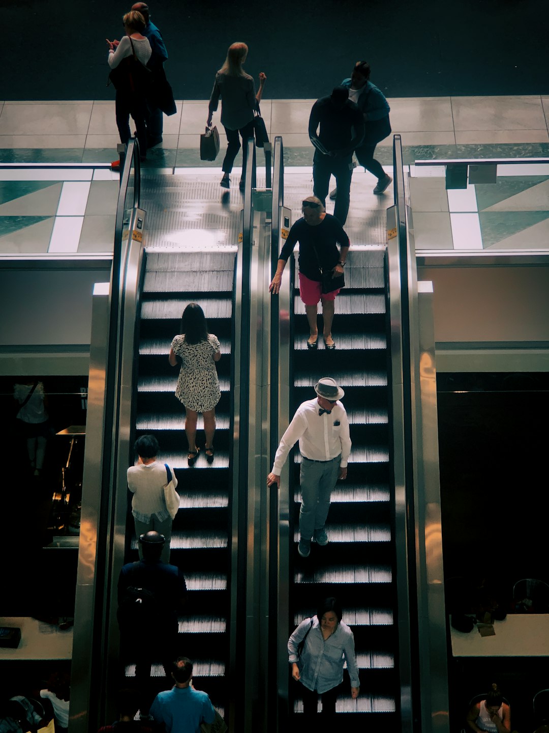 people on escalator