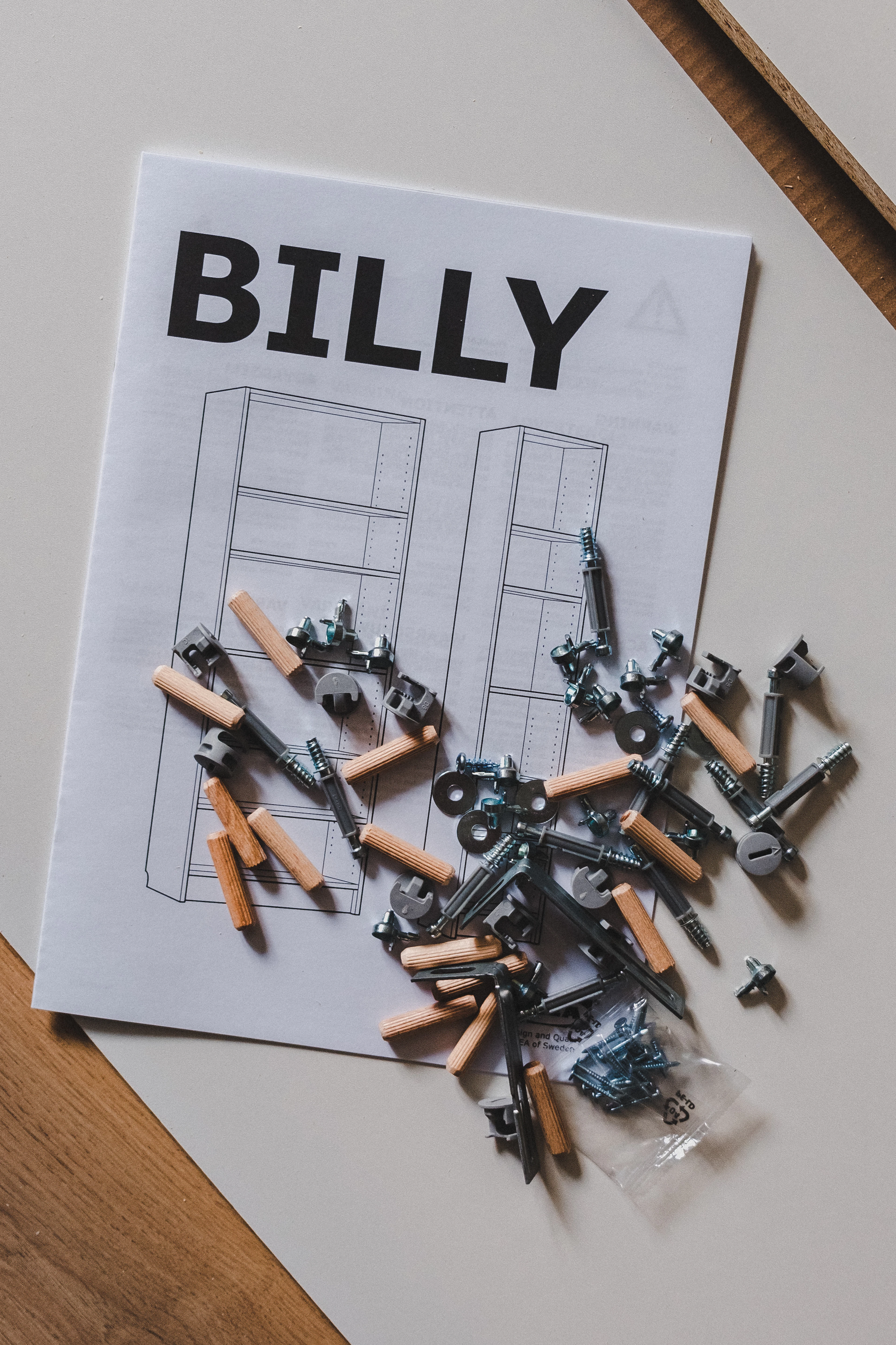 Assembly screws laid out on paper