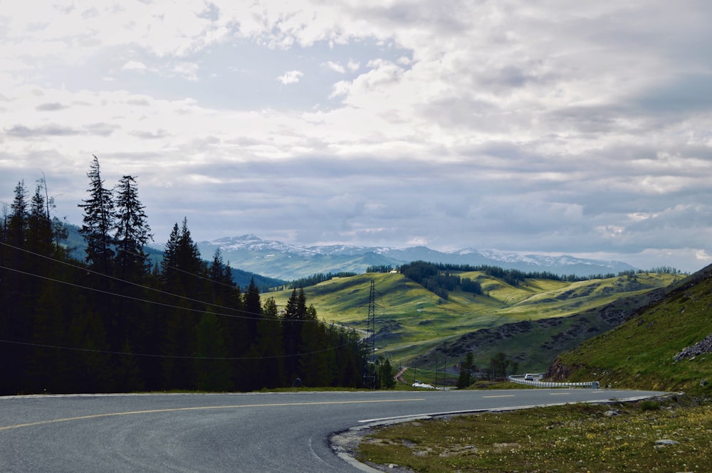 concrete road near mountains