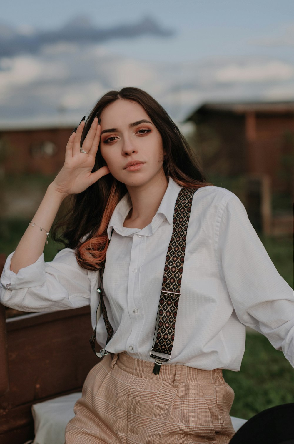 woman in white and brown jumper