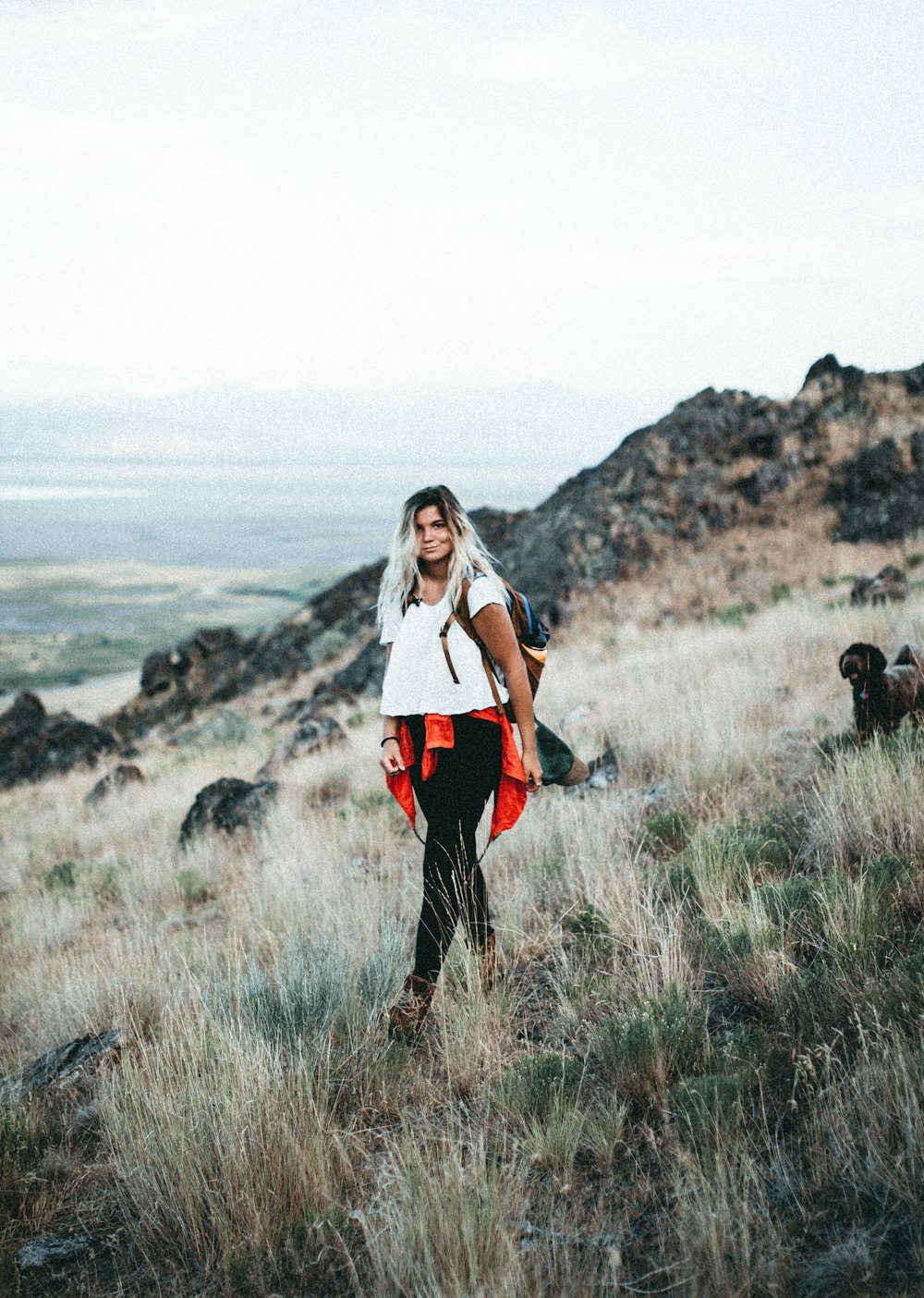 woman standing on grasses