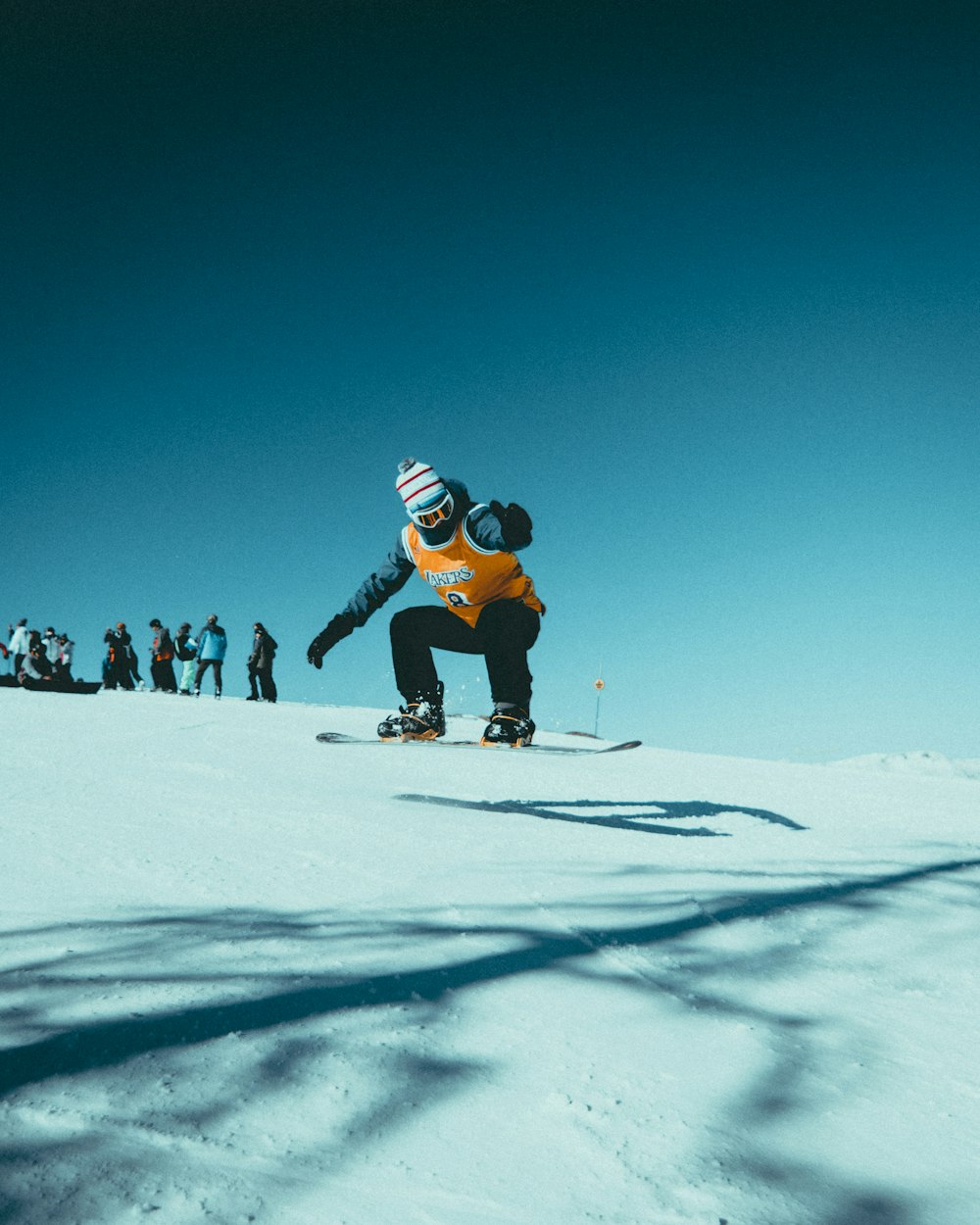 man skiing on snowy field during daytime