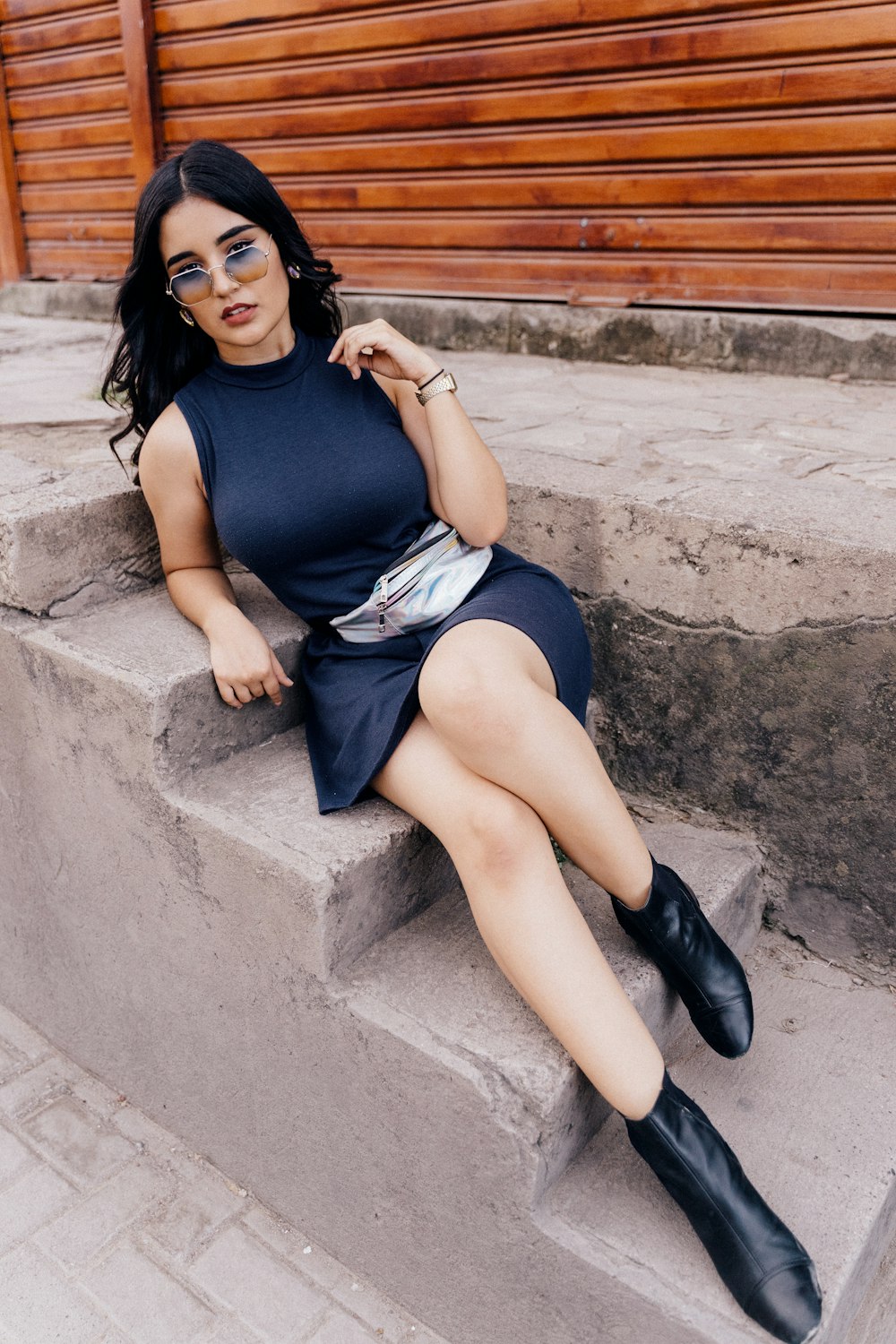 woman wearing blue bodycon dress