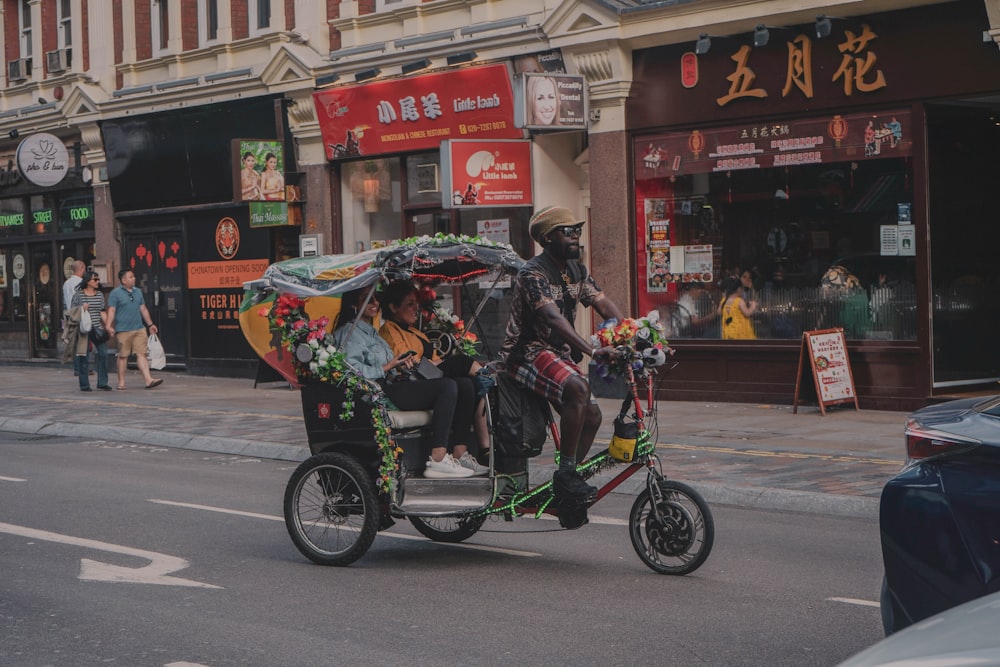 photo of man riding trike