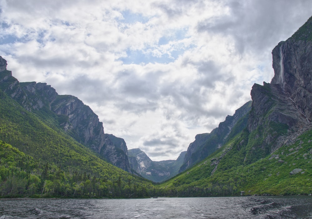 mountain ranges surrounding body of water