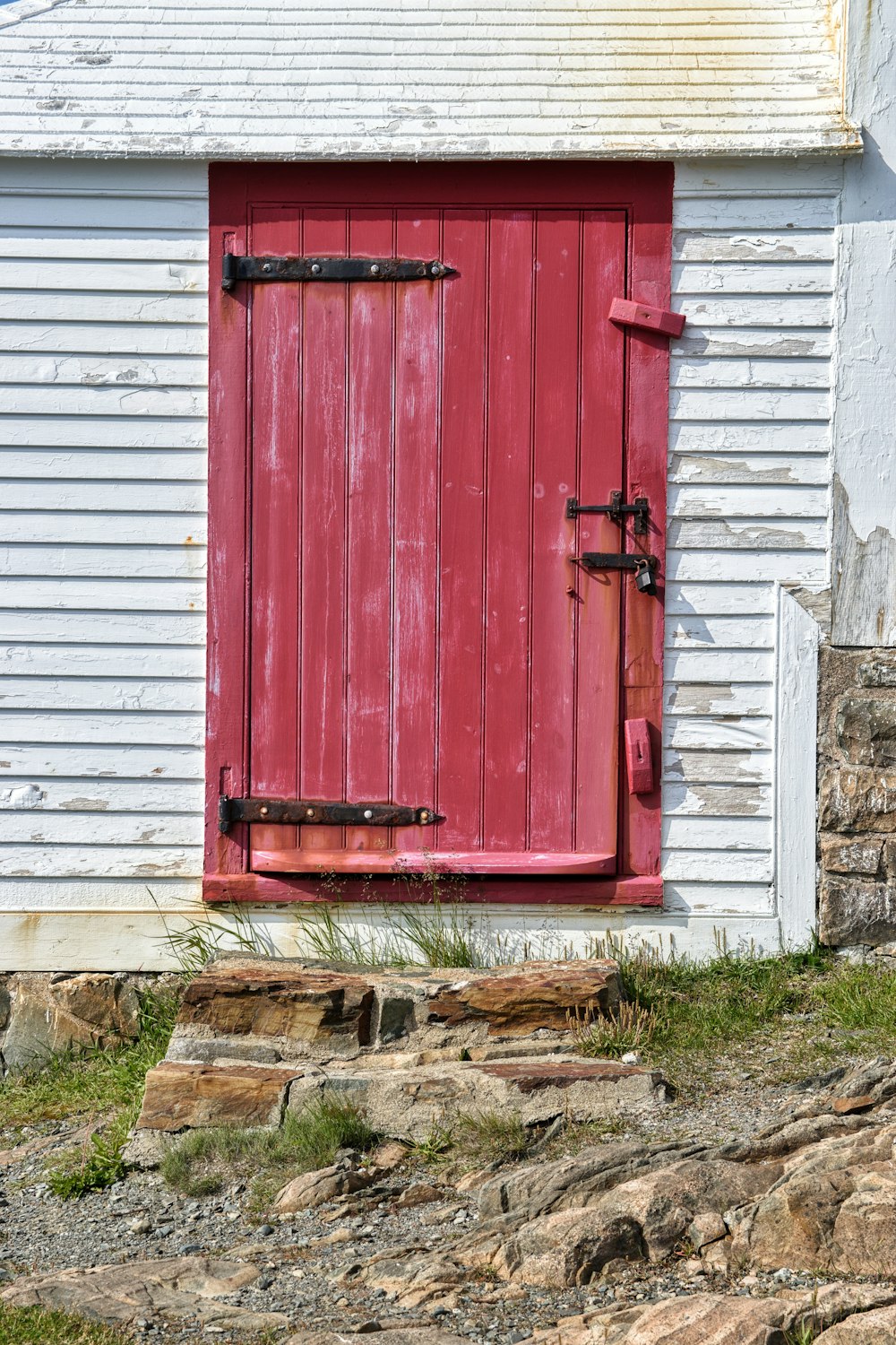 photo of red wooden flush-panel door