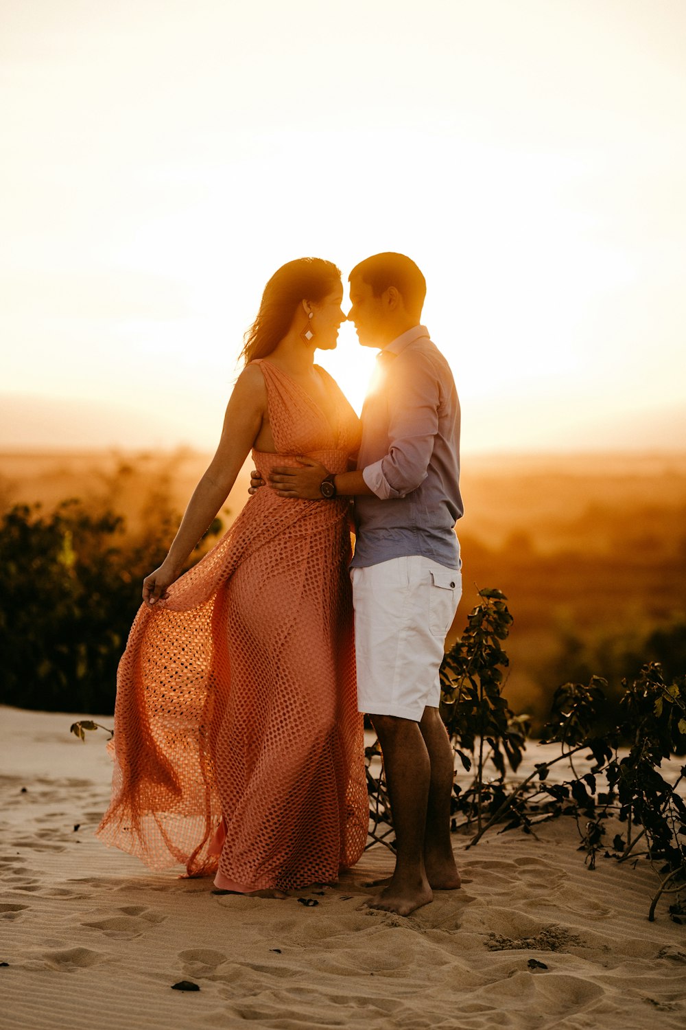 man and woman on shore