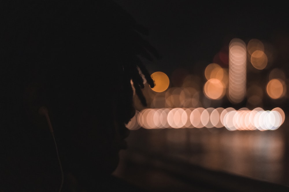 a blurry photo of a city street at night