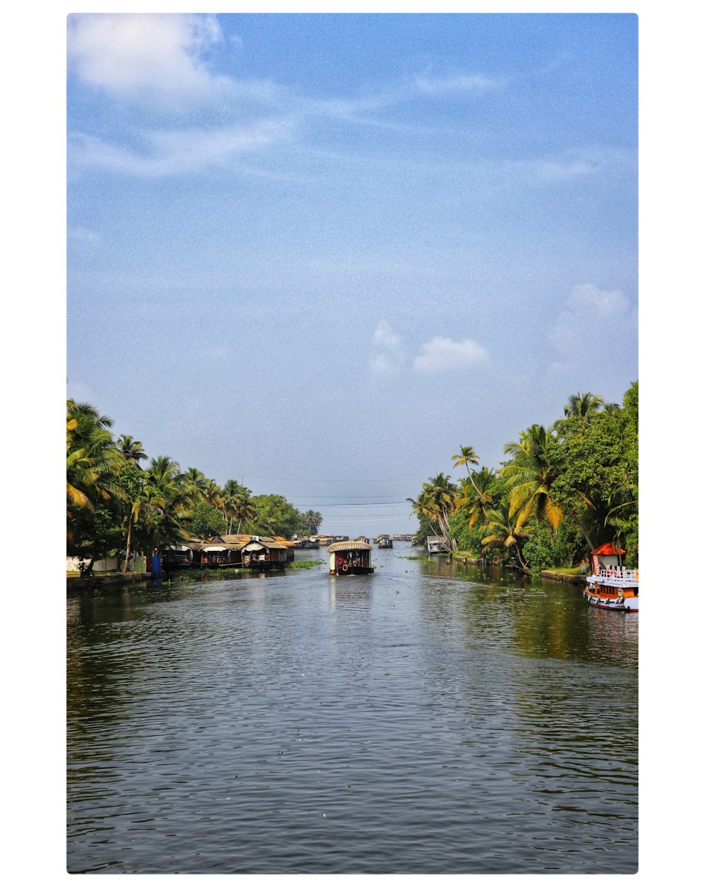 boats on river during daytime