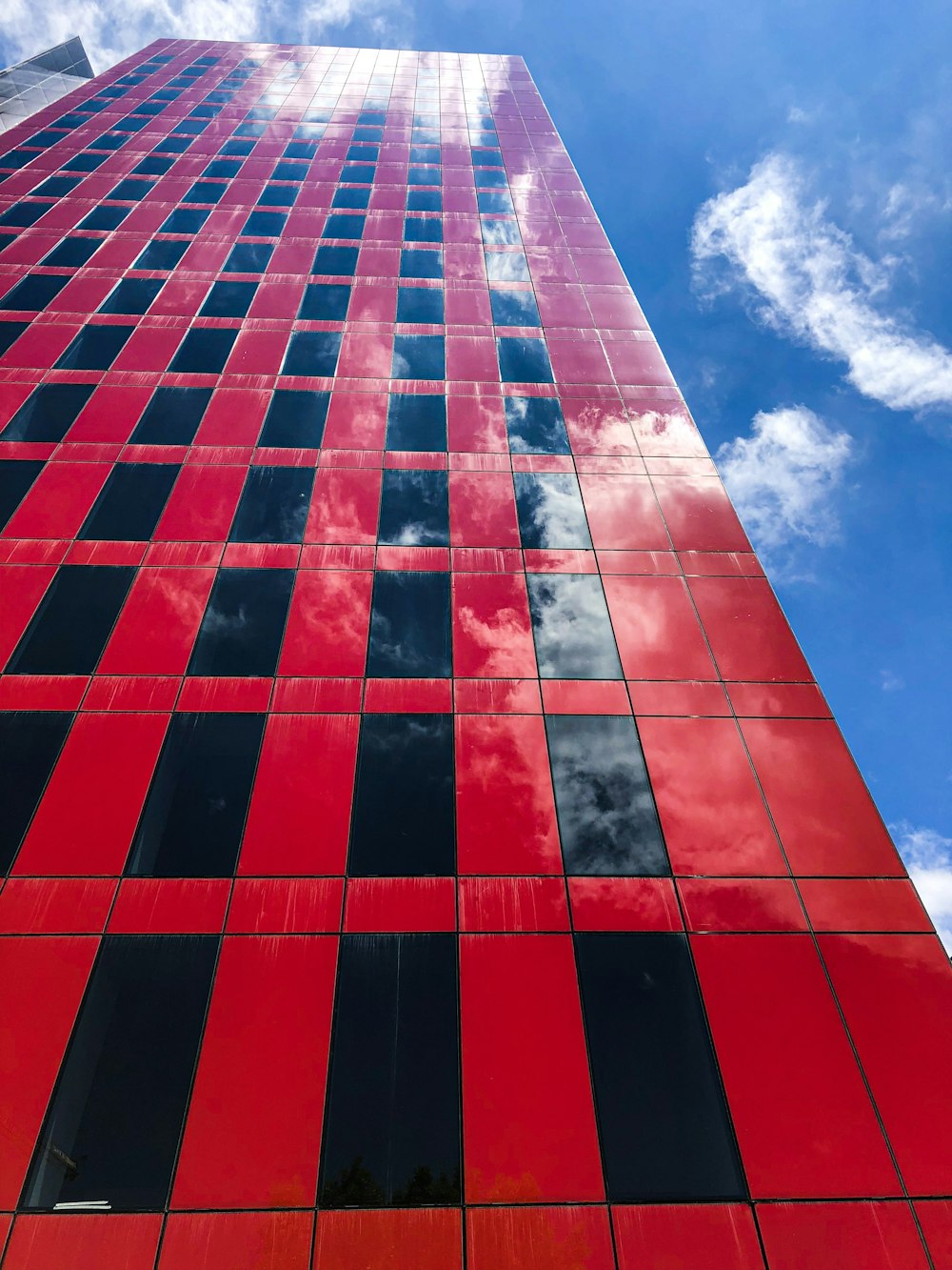 red concrete high-rise building