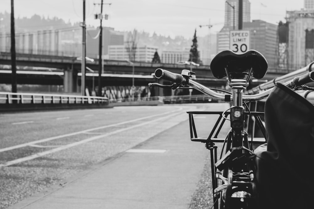 bike parked beside railing during day