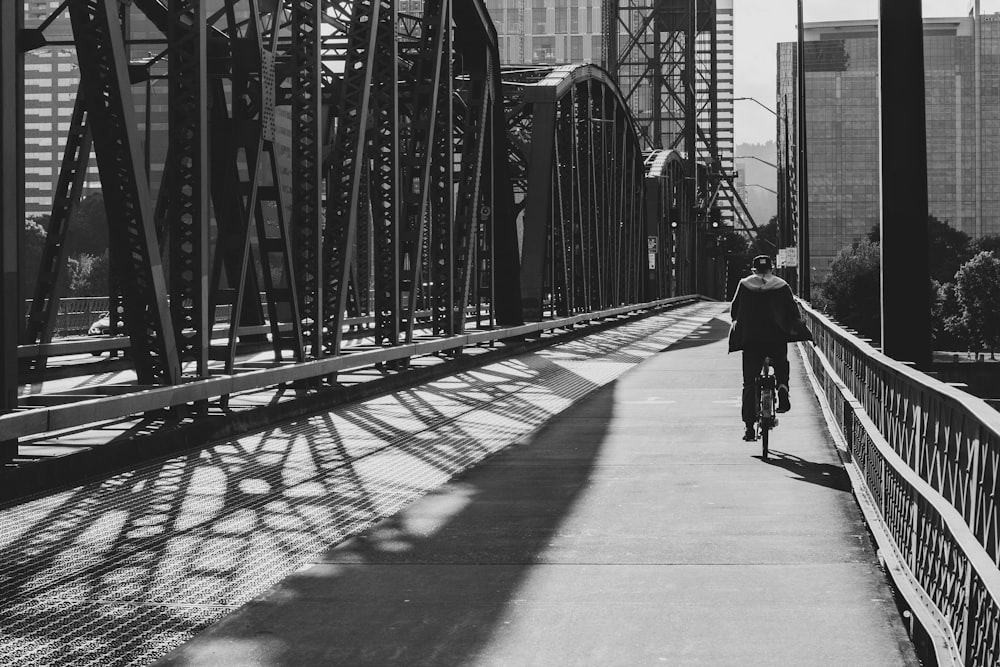 person riding bicycle on road