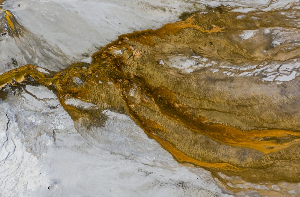 an aerial view of a mountain covered in snow