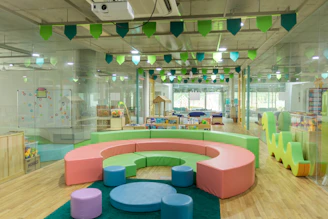 Bright and cheerful kids wearing colorful outfits, smiling and playing in a clean, modern setting with soft animated icons.