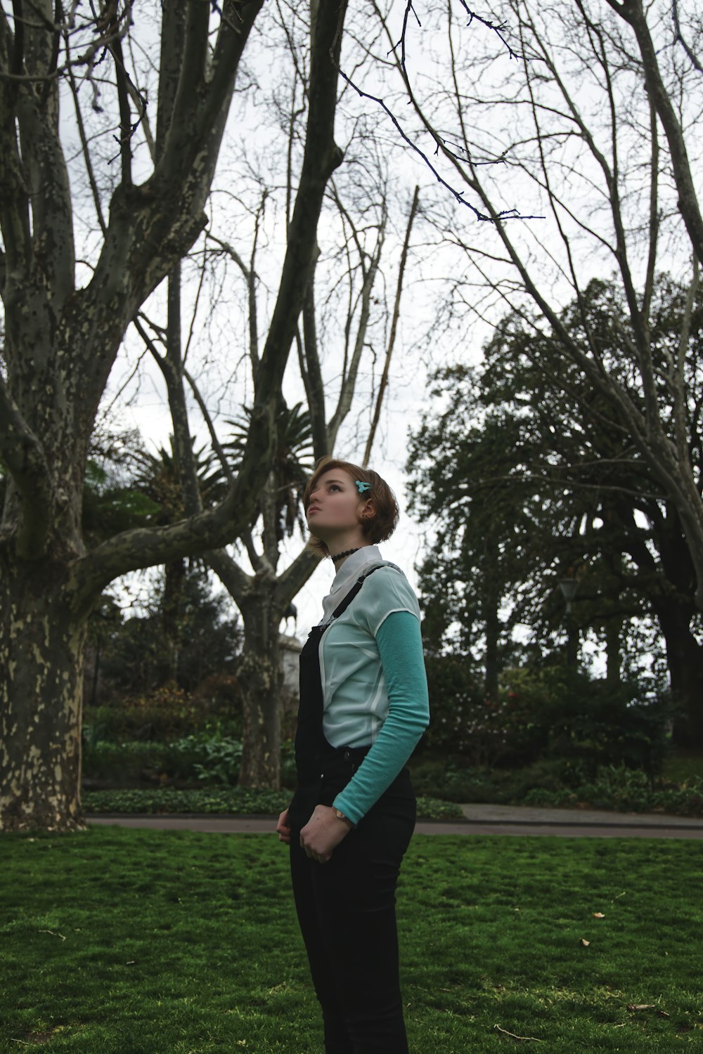woman standing near tree