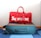 A satisfied customer showcasing their new luggage from Tres Company.
