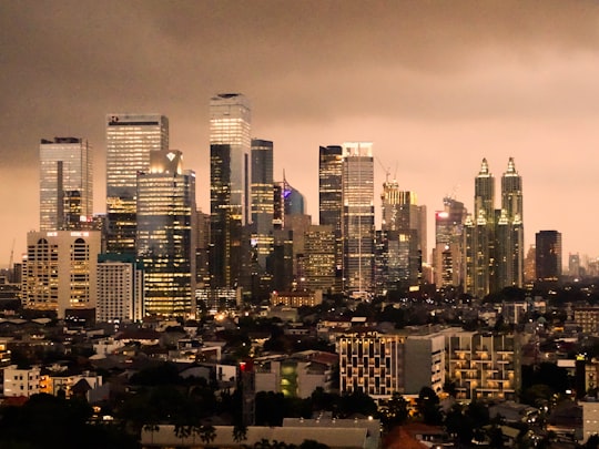 city with high-rise buildings during night time in Jakarta Selatan Indonesia