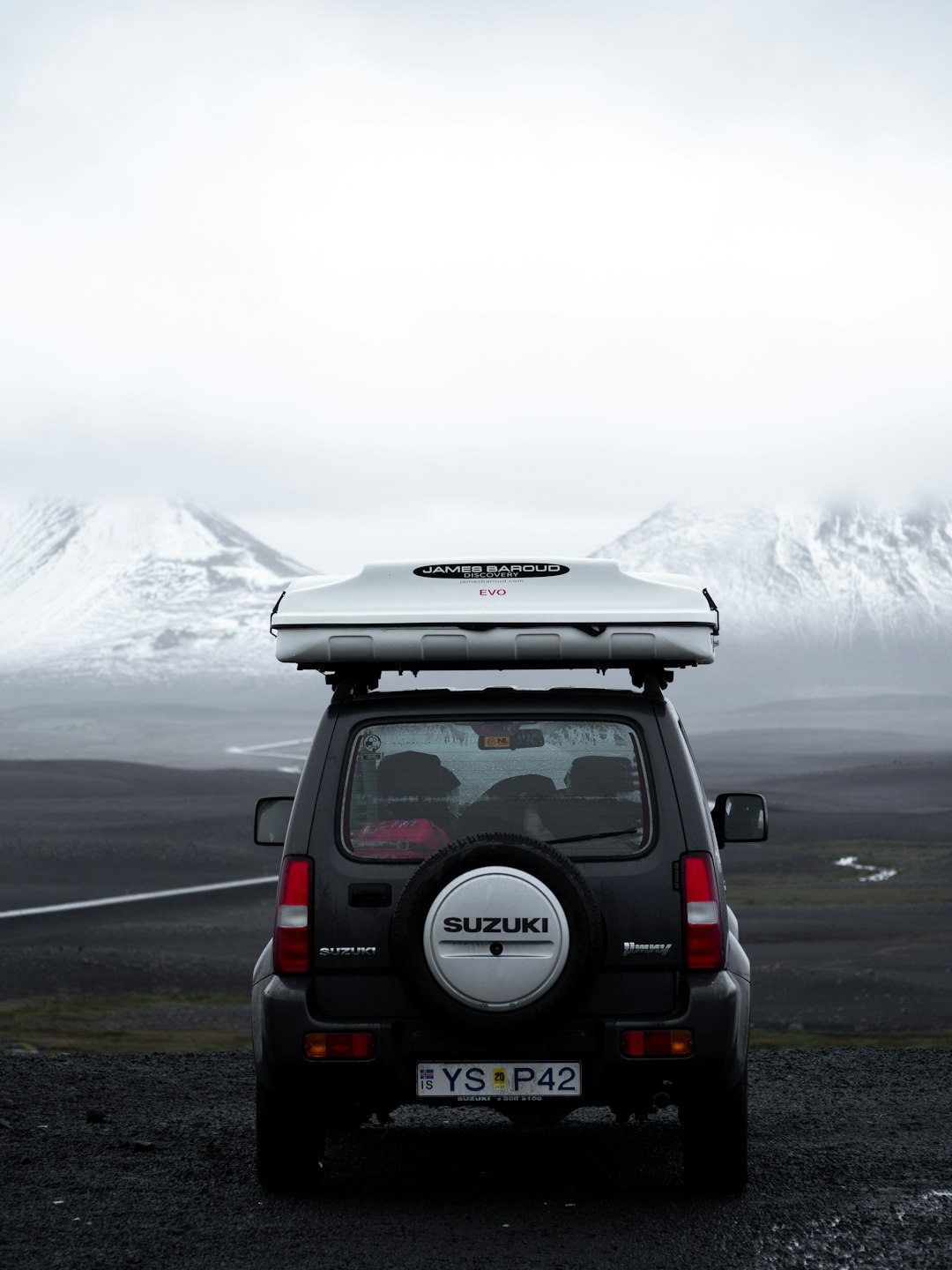 black Isuzu vehicle