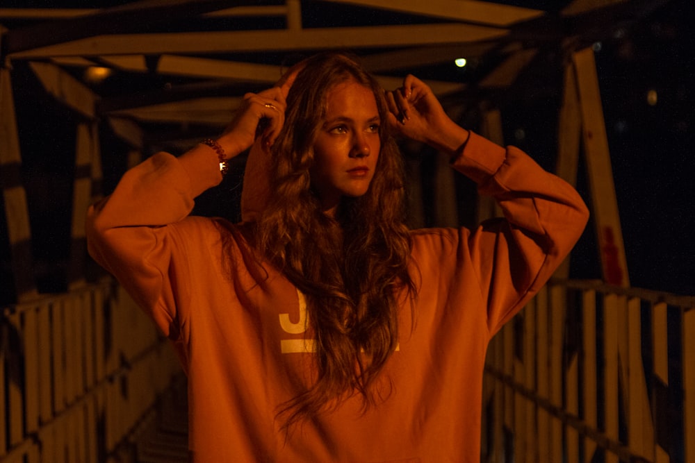 woman wearing yellow hoodie