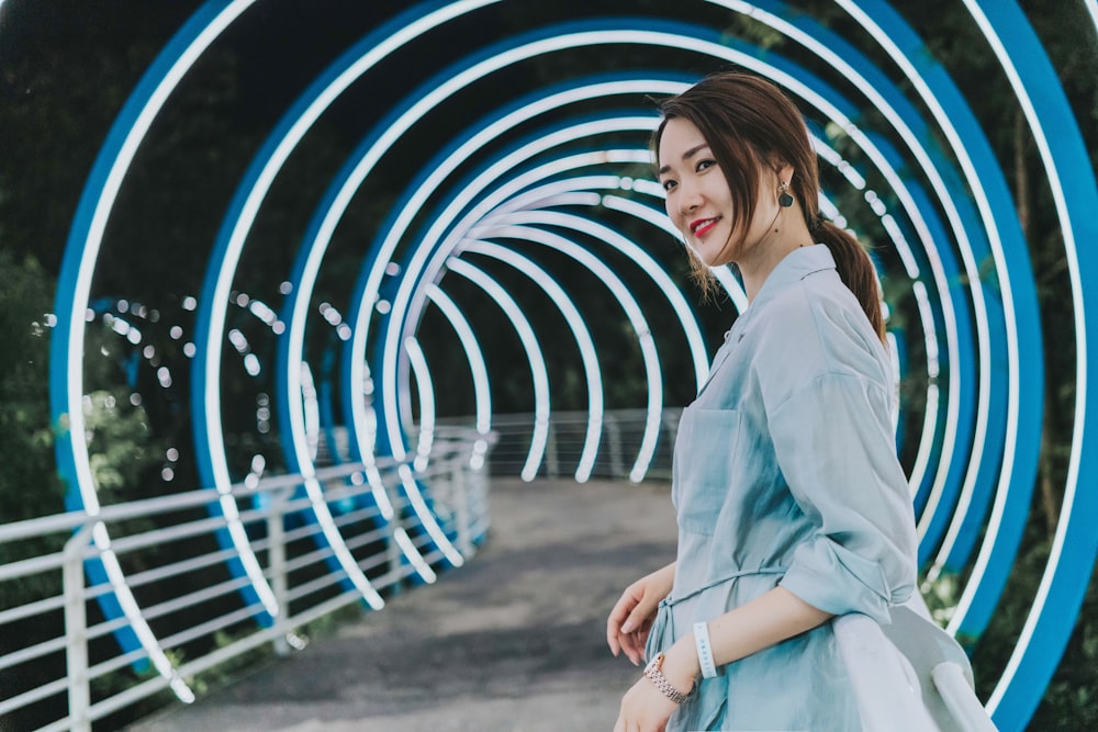 woman walking on bridge