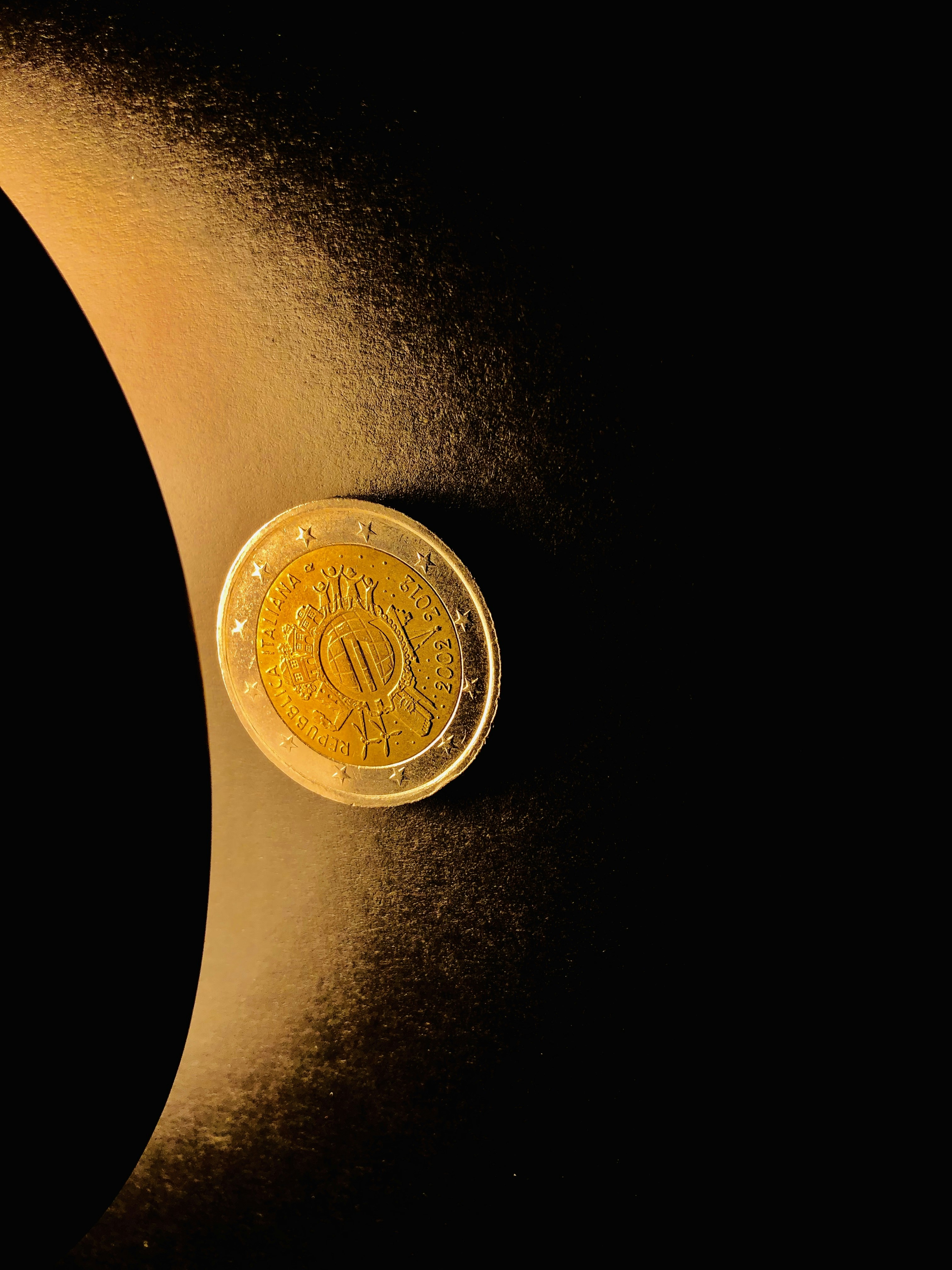 round gold-colored coin