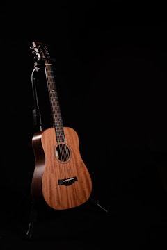 brown acoustic guitar