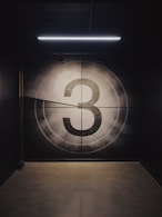 black number 3 wall paint