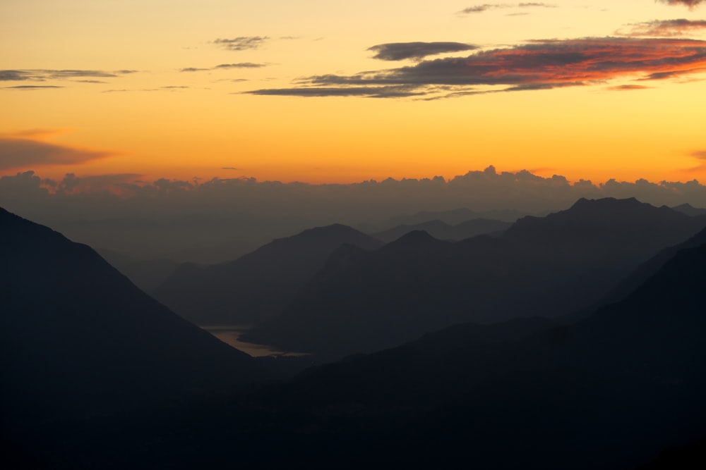 silhouette of photography of mountain range during daytime