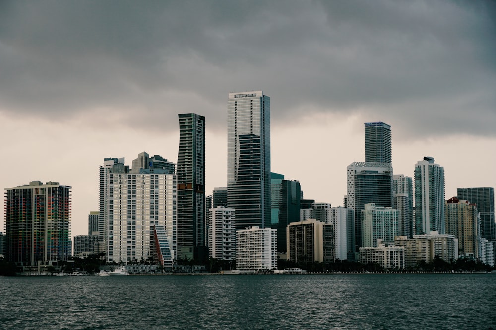 high-rise building near body of water